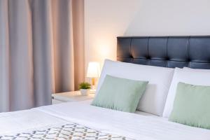 Cama o camas de una habitación en Gracia Bas Apartments Barcelona