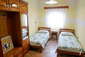 Posteľ alebo postele v izbe v ubytovaní Villa Veli Vrh