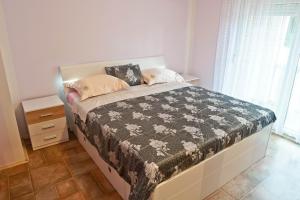 Posteľ alebo postele v izbe v ubytovaní Villa Veli Vrh