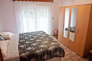 Posteľ alebo postele v izbe v ubytovaní Villa Veli Vrh