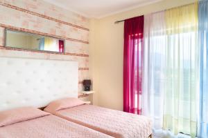 Postel nebo postele na pokoji v ubytování Victoria Hill Hotel