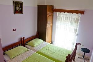 Posteľ alebo postele v izbe v ubytovaní Villa Veli Vrh