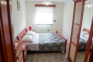 Posteľ alebo postele v izbe v ubytovaní Villa Veli Vrh