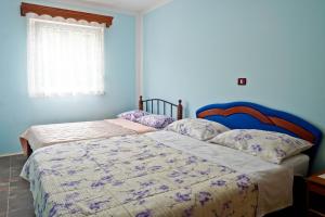 Posteľ alebo postele v izbe v ubytovaní Villa Veli Vrh