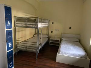 A bed or beds in a room at El cordal de laciana