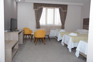 TV a/nebo společenská místnost v ubytování Hotel Intergaj Bijeljina
