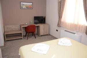 TV a/nebo společenská místnost v ubytování Hotel Intergaj Bijeljina