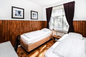 Letto o letti in una camera di Guesthouse Aurora