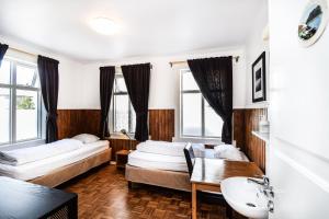 Letto o letti in una camera di Guesthouse Aurora