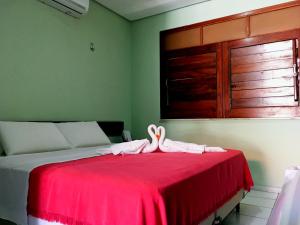 Ліжко або ліжка в номері Hotel Pousada Dos Ventos