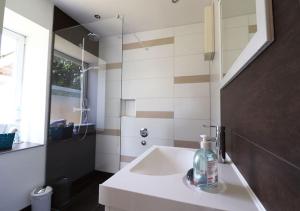 Koupelna v ubytování Ferienhaus geStRanDeT + 26 fotografií