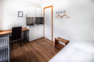 A cozinha ou kitchenette de Guesthouse Andrea