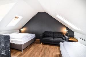 Uma cama ou camas num quarto em Guesthouse Andrea