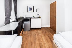 A cozinha ou kitchenette de Guesthouse Andrea