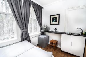 A cozinha ou kitchenette de Guesthouse Andrea