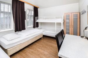 Uma cama ou camas num quarto em Guesthouse Andrea