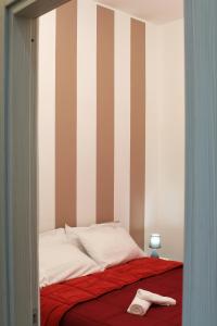 Postel nebo postele na pokoji v ubytování Le Mirage boutique II