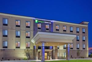a hospital building with a sign on the front of it at Holiday Inn Express Hotel and Suites Lincoln Airport, an IHG Hotel in Lincoln