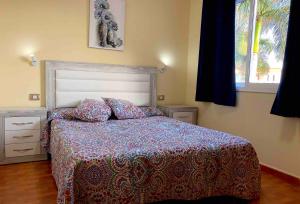 Posteľ alebo postele v izbe v ubytovaní Apartamentos La Puntilla Mogan