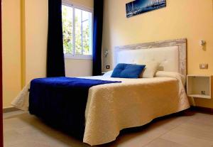 Posteľ alebo postele v izbe v ubytovaní Apartamentos La Puntilla Mogan