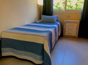 Posteľ alebo postele v izbe v ubytovaní Apartamentos La Puntilla Mogan