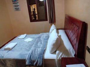 Postel nebo postele na pokoji v ubytování hotel arganier tafraoute