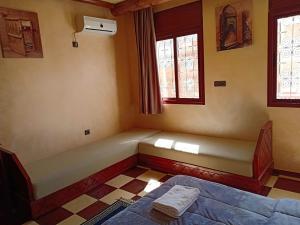 Postel nebo postele na pokoji v ubytování hotel arganier tafraoute