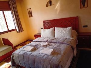 Postel nebo postele na pokoji v ubytování hotel arganier tafraoute