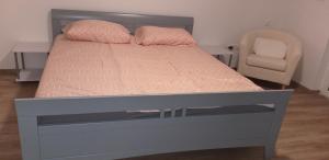 Postel nebo postele na pokoji v ubytování Apatmaji Pika 2