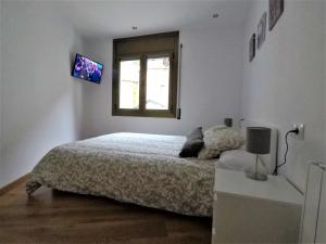 Voodi või voodid majutusasutuse Piso Andorra toas