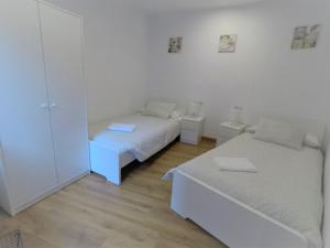 Voodi või voodid majutusasutuse Piso Andorra toas