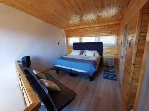 Krevet ili kreveti u jedinici u okviru objekta Hermosa casa en Pichilemu, en condominio con salida al mar