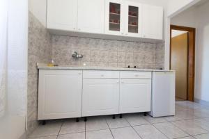Kuchyň nebo kuchyňský kout v ubytování Apartments Jaksa + 31 fotografií