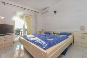 Posteľ alebo postele v izbe v ubytovaní Apartments Ana Maria