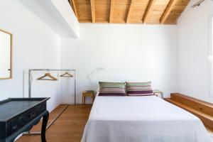 Postel nebo postele na pokoji v ubytování Baía das Caldeirinhas