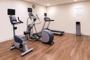 a gym with cardio equipment in a room at Holiday Inn Express Fort Worth West by IHG in Fort Worth
