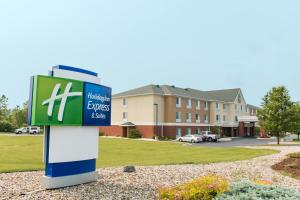a sign in front of a building at Holiday Inn Express Jackson by IHG in Jackson