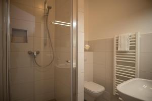 Koupelna v ubytování Hotel Hanseat Stralsund