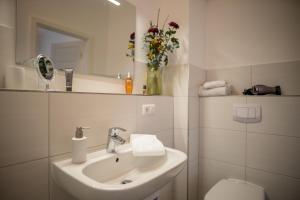 Koupelna v ubytování Hotel Hanseat Stralsund