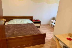 Posteľ alebo postele v izbe v ubytovaní Apartamencik Centrum