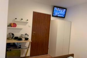 Kuchyňa alebo kuchynka v ubytovaní Apartamencik Centrum