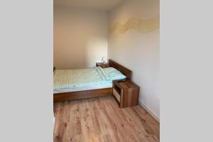Posteľ alebo postele v izbe v ubytovaní Apartamencik Centrum
