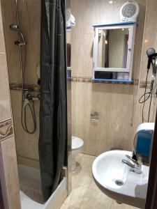 Et badeværelse på Hotel Arbre De Neu