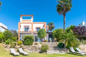 A garden outside Villa Golf Sanlucar