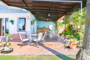 Vonkajšia záhrada v ubytovaní Villa Golf Sanlucar