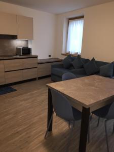 Kuchyňa alebo kuchynka v ubytovaní MOUNTAIN RESORT Appartamenti