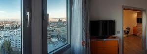 TV a/nebo společenská místnost v ubytování Hotel Continental