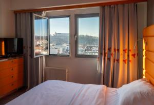 Postel nebo postele na pokoji v ubytování Hotel Continental