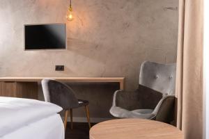 Televisyen dan/atau pusat hiburan di ibis Styles Dresden Neustadt