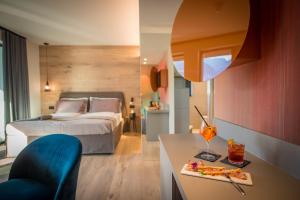 En eller flere senger på et rom på Hotel Villa Enrica